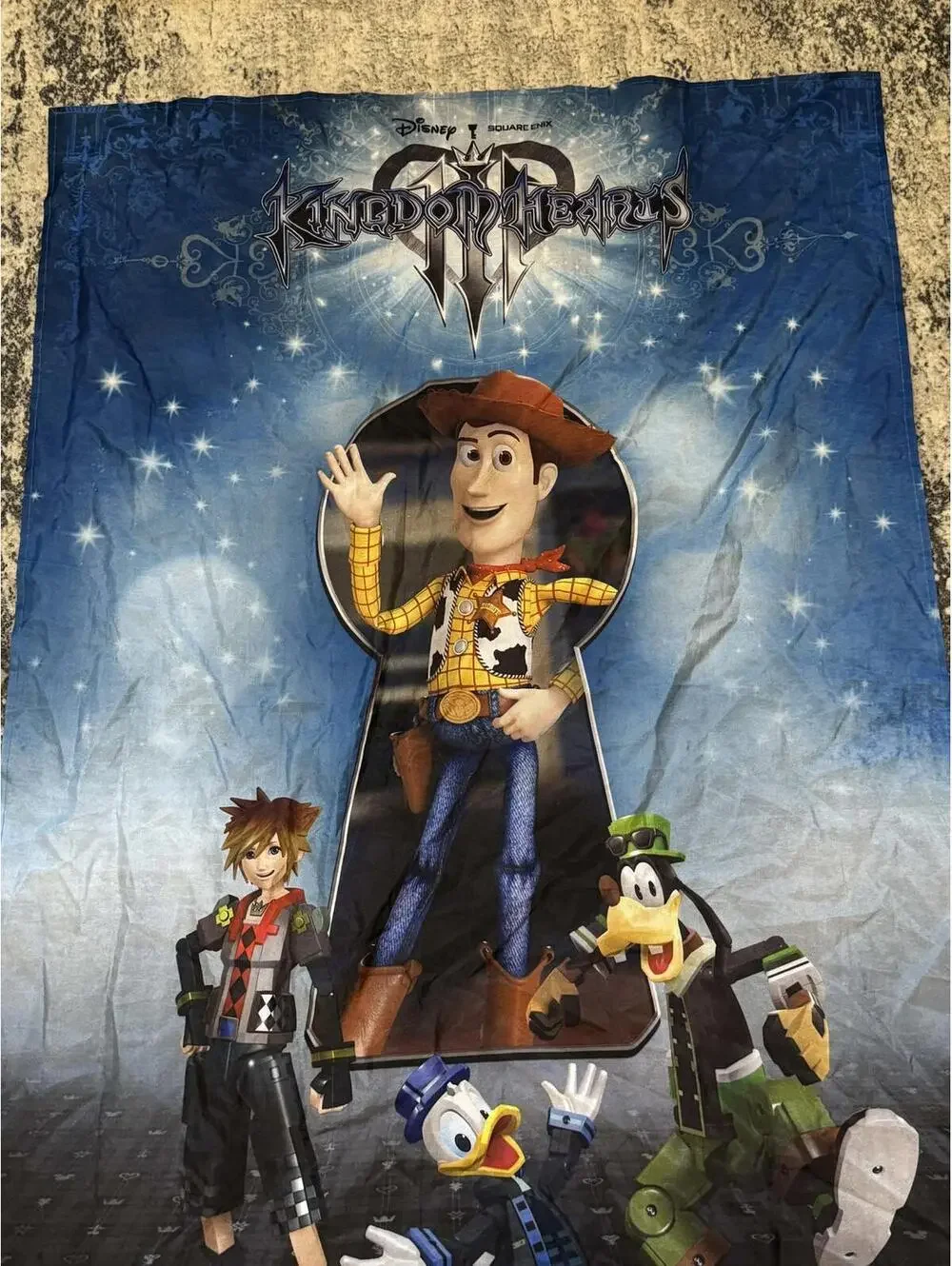 Kingdom Hearts III Fabric panel Featuring Woody, Sora, Donald, and Goofy
